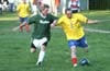 Rene Gutierrez of Maidstone, blasting the ball before Jeff Esposito gets it
