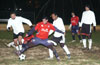 Jefferson Ramirez of Maidstone protecting the ball from Christian Montes(left) and Mark Hogg(right) of Bateman