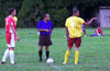 Gary Easlick of Tortorella Pools(left) Alex(ref) and Cesar Galea of Hamptons Arsenal just before kick off