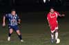 Rodolfo Marin of Tortorella Pools(right) dribbling by Gonzalo Presedo of Espo's