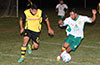 Juan Zuluaga of Bateman trying to catch up to Isaac Bonilla of FC Tuxpan(right)