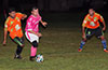 Luis Munoz of FC Tuxpan(center) holding off Tono Gonzalez(left) and Irineo Amador of Hampton FC