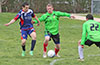 Andriy Pozdniakov of Hampton FC(center) protecting the ball from Antonio Padilla of Maidstone Market(left)