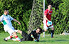 Alejandro Bolanos of Tortorella Pools(center) sliding to block the shot taken by Frank Reyes of FC Tuxpan