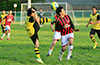 Edvardo Penaianda of Bateman Painting(left) doing a high kick next to Marco Bautista of Cuenca FC