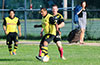 Jaime Rincon of Bateman(#14) protecting the ball from Andriy Pozdiakov of Hampton FC