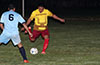 Carlos Bolvito of FC Tuxpan blasting the ball up the field