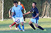 Michael Garcia of Maidstone watching the ball as Hampton FC defender Gerber Garcia watches Michael