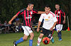 Matthew Rojano of Sag Harbor(left) about to dribble by Jonathan Lizano of Bateman Painting