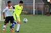 Clinton Perez of Hampton FC(right) guarding the ball from Carlos Portillo of Bateman Painting