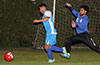 David Rodriguez of Tortorella Pools(left) trying to get by Juan Carlos of FC Tuxpan
