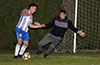 Cristian Rios of Hampton Construction coming out to block a shot taken by Maicol Parra of Hampton Pool Shark