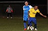 Esteban Uchupaille of Tortorella Pools preventing Alberto Carreto of FC Tuxpan from heading toward the goal