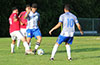 Rafael Godinho of Hampton FC(center) protecting the ball from Juan Zuluaga(left) and Erasmo Guzman(rear) of Sag Harbor