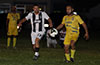 Manuel Ramos of Sag Harbor(left) and Melvin Solar of FC Tuxpan watching the ball
