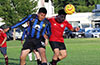 Miguel Ramirez of Southampton FC(left) and a East Hampton SC defender