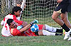 Alex Mesa of Maidstone in agony after a save