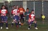 A shot on the Tuxpan goal(red/white)