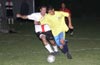 Rafael Godinho of Casual(right) just too fast for Manuel Lizano(rear) of Bateman