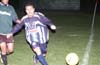 Bernabe Hernandez of Tuxpan about to prevent the ball from going out of bounds