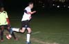 Manuel Lizano of Bateman(right) back kicking the ball between the legs of Winston Reid of L.I. Rottweilers