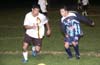 Jefferson Ramierz of Maidstone(left) and Antonio Padilla(right) of Tuxpan racing toward the ball