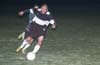 Steven Orrego(front) of Maidstone holding off a Bayberry defender