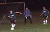 Roger King of Bayberry moving the ball from his goalie box and (l-r) Alex Cannon, Cesar Bautista, Steven Orrego, and Adam Lancashire look on