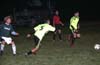 Fabian Arias(center) and Albeiro Betancur(right) of the Rottweilers going for the ball