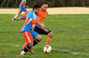 Marco Bautista of The Hideaway(front) about to get by Luis Corra of Maidstone Market