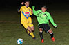 Albeiro Betancur of FC Tuxpan(left) and Oscar Reinoso of Hampton FC racing toward the ball