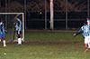 Bateman Painting players watching the ball as it is about to deflect off the goal post and out into the field