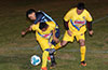 Jonathan Lizano of Bateman(center) trying to steal the ball from Josue Zurdo(left) and Enrique Pichardo of FC Tuxpan