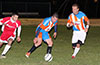 Daniel Bedoya(left) of Tortorella wanting to steal the ball from Cristian Rojo of The Hideaway as Tony Shoshi looks on