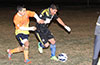 Mario Olaya of Maidstone(left) trying to push Tono Gonzales of Hampton FC away from the ball