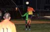 Angel Garces of Maidstone Market jumping in front of a Hampton FC defender to head the ball