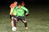An Hampton FC defender protecting the ball from John Romero of Maidstone Market