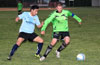 Jose Almonsa of Hampton FC(right) protecting the ball from Diego Guazhambo of Bateman Painting