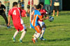 Marco Bautista of The Hideaway(#10) being guarded by Cristian Duran(#4) and Rodolfo Marin of Tortorella Pools