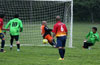 Oscar Reinoso of Hampton FC(right) taking a shot on Antonio Chavez of FC Tuxpan