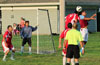 Rudolfo Marin of Tortorella Pools(left) and Carlos Torres of Maidstone Market going for the ball inside the Tortorella goalie box