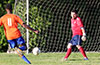 Gaye Mouhamadou of EH Soccer Fever taking a shot at Alex Mesa of Maidstone Market