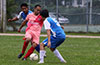 Xavi Piedramartel of Maidstone Market(center) between two Tortorella Pools defenders