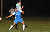 Sebastian Kruly of East Hampton(rear) jumping over Jon Lizano of Tortorella Pools to head the ball
