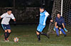 Gustavo Gutama of East Hampton SC(left) about to take a shot at the Tortorella Pools goal
