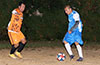 Cristian Munoz of Tortorella Pools about to get by Alberto Carreto of FC Tuxpan