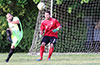 Charles Escalante of Maidstone blasting the ball up the field