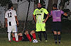 Alex Mesa of Maidstone(on ground) delaying the game
