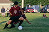 Mark Bako of East Hampton(front) protecting the ball from Cristian Compuzano of FC Tuxpan