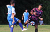 Eddie Lopez of Tortorella Pools(left) kicking the ball into Jose Gutierrez of FC Tuxpan